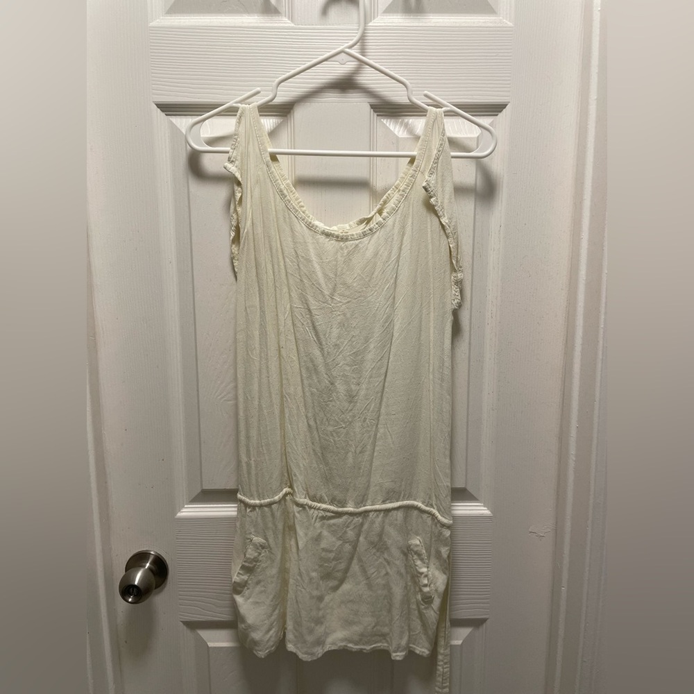 Short dress. Barely an off-white color. Size small. Feels like  linen cotton